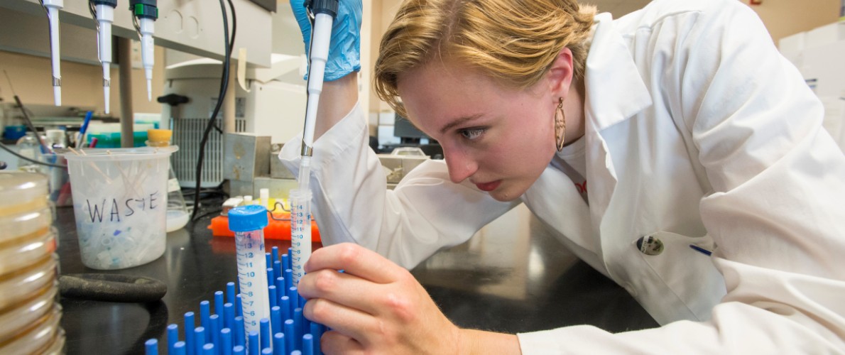 Female student working in the science lab