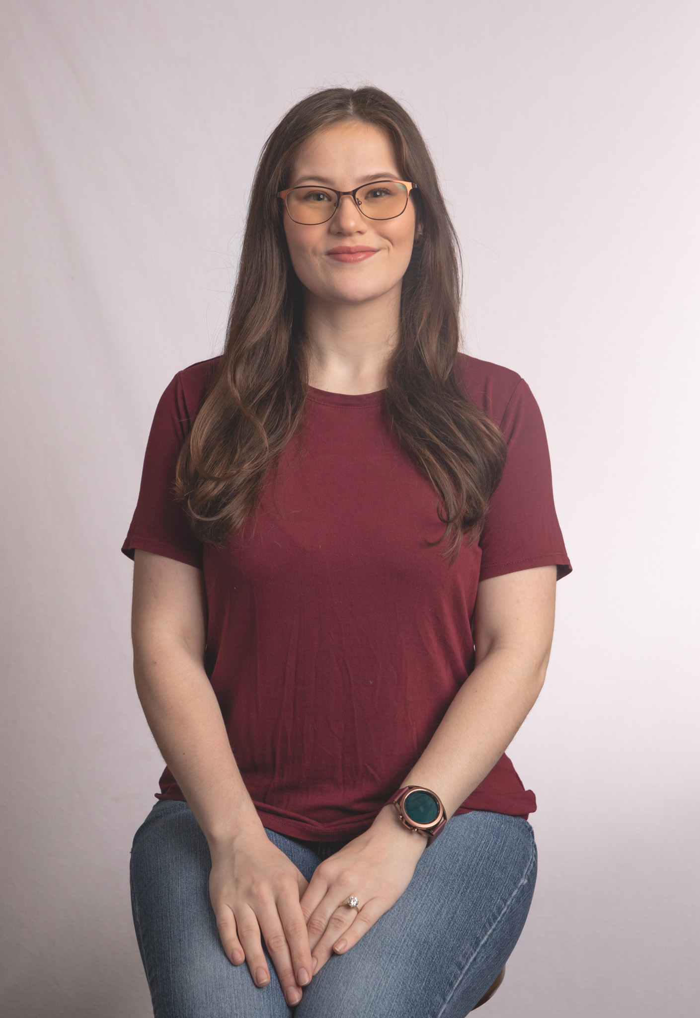 Rachel Hutchinson in a red shirt and jeans