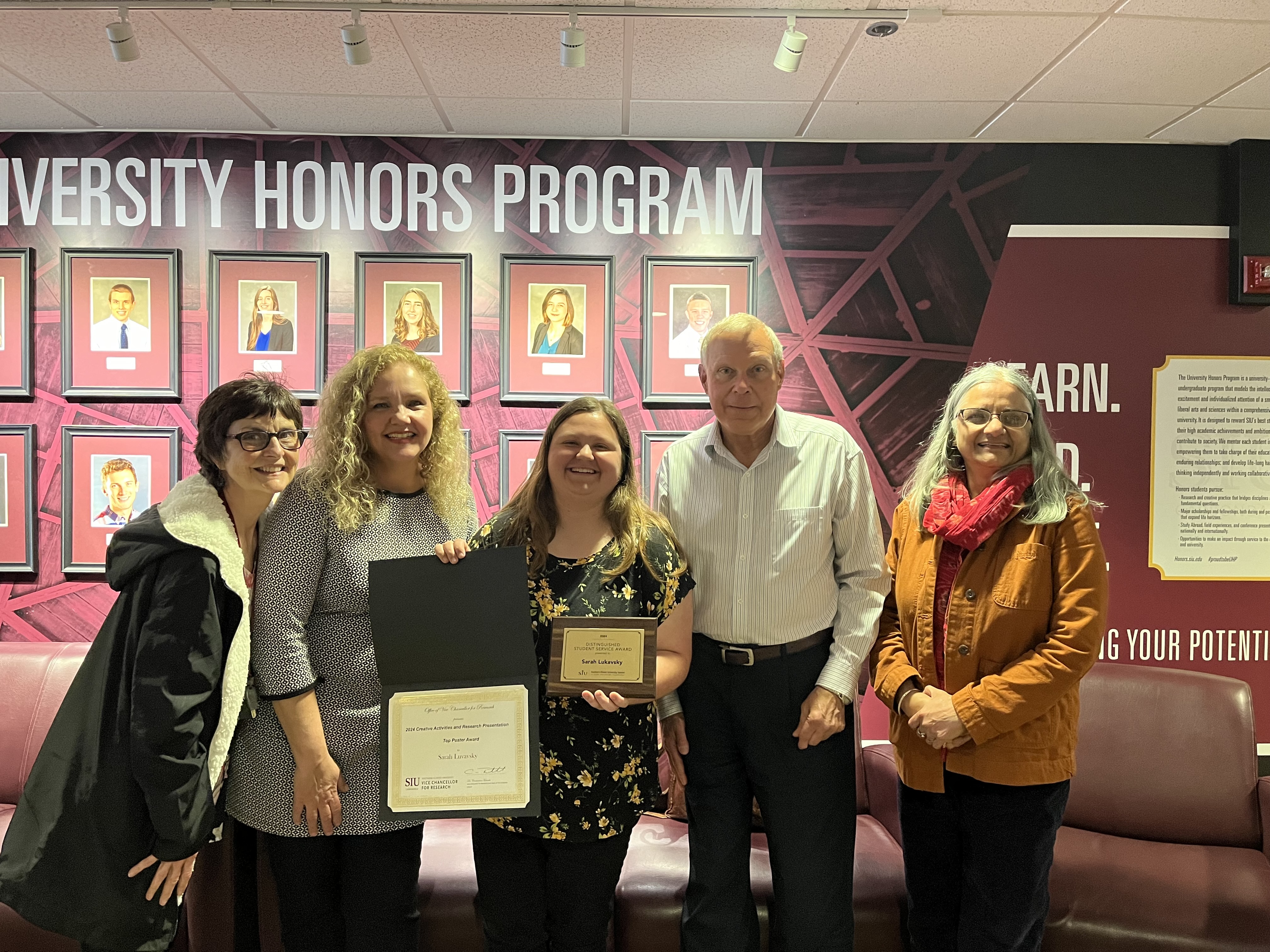 Sarah Lukavsky poses with University Honors Program staff